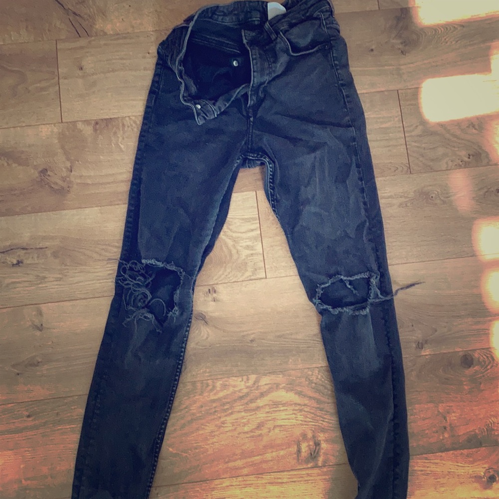Black distressed denim